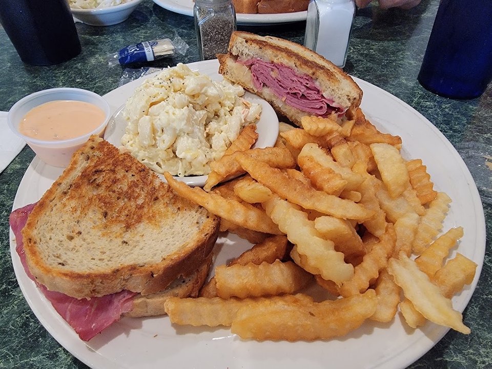 Classic diner tables with simple sandwich plates.